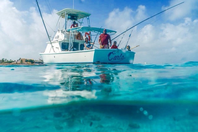 A sport fishing boat on blue water