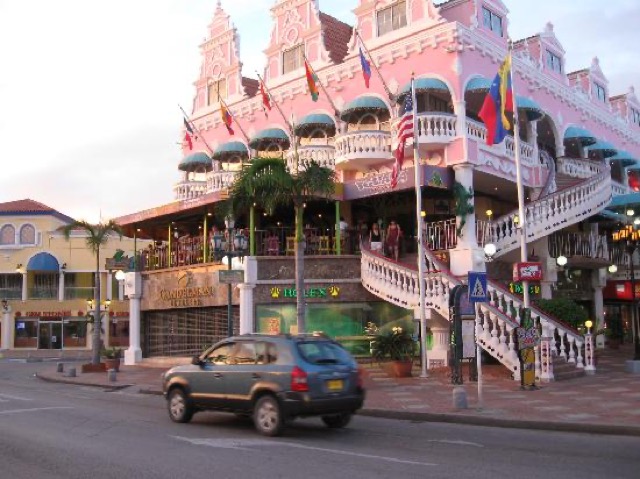 The pink colonial building that houses Iguana Joe’s