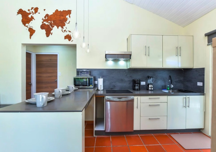 Kitchen with white cabinets and modern appliances