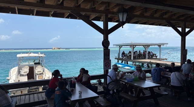 Diners at Zeerovers on the dock over the water